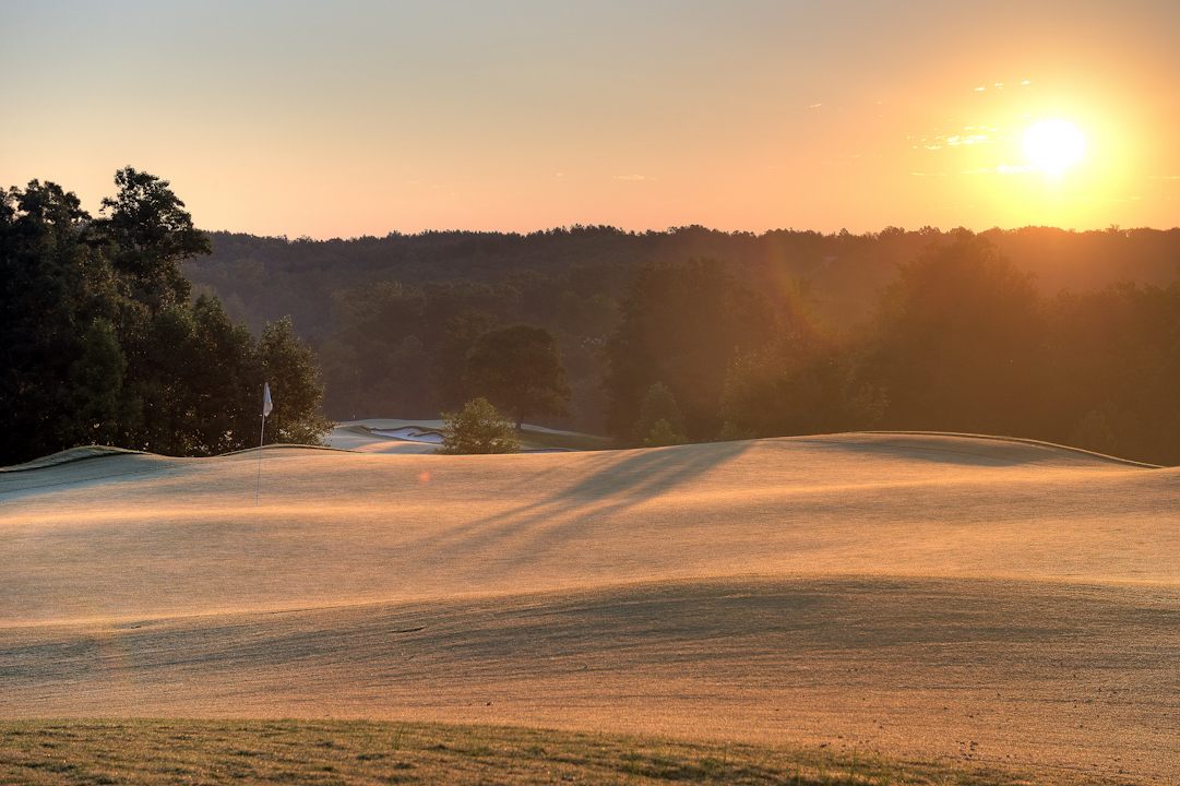 Professional Resort Photography and Video - Warmth of the sun over frosty grass early morning sunrise