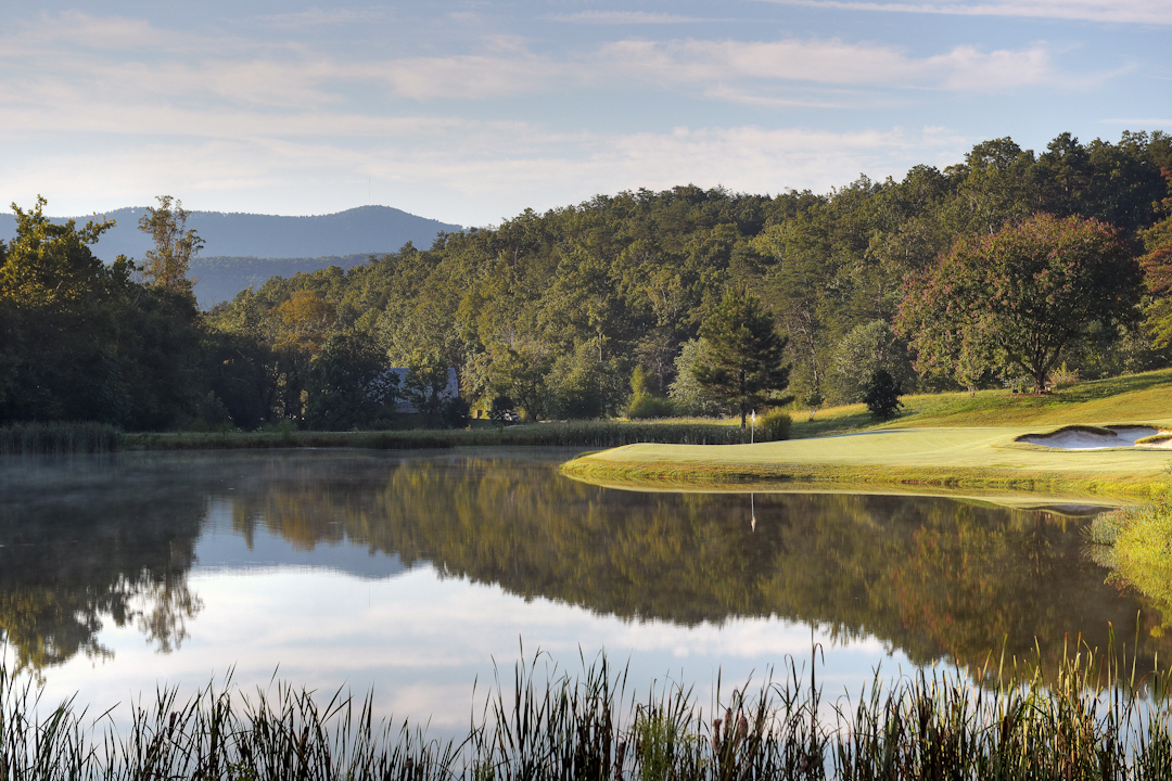 Professional Resort Photography and Video - Golf course water hole with mountains in background