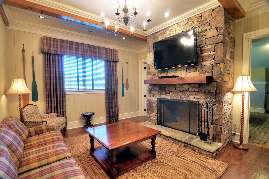 Professional Resort Photography and Video - Penthouse Suite Sitting Room with Stacked Stone Gas Fireplace